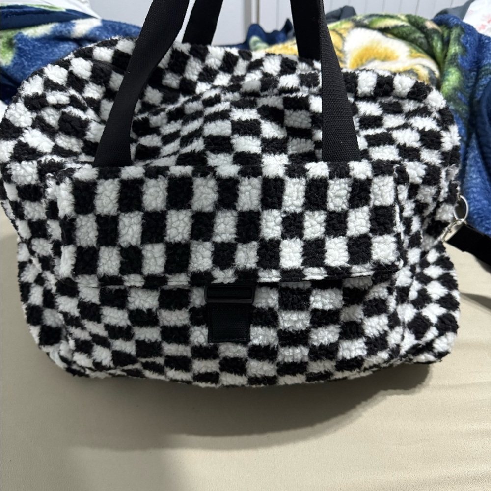 Madden girl checkered Sherpa Duffle bag